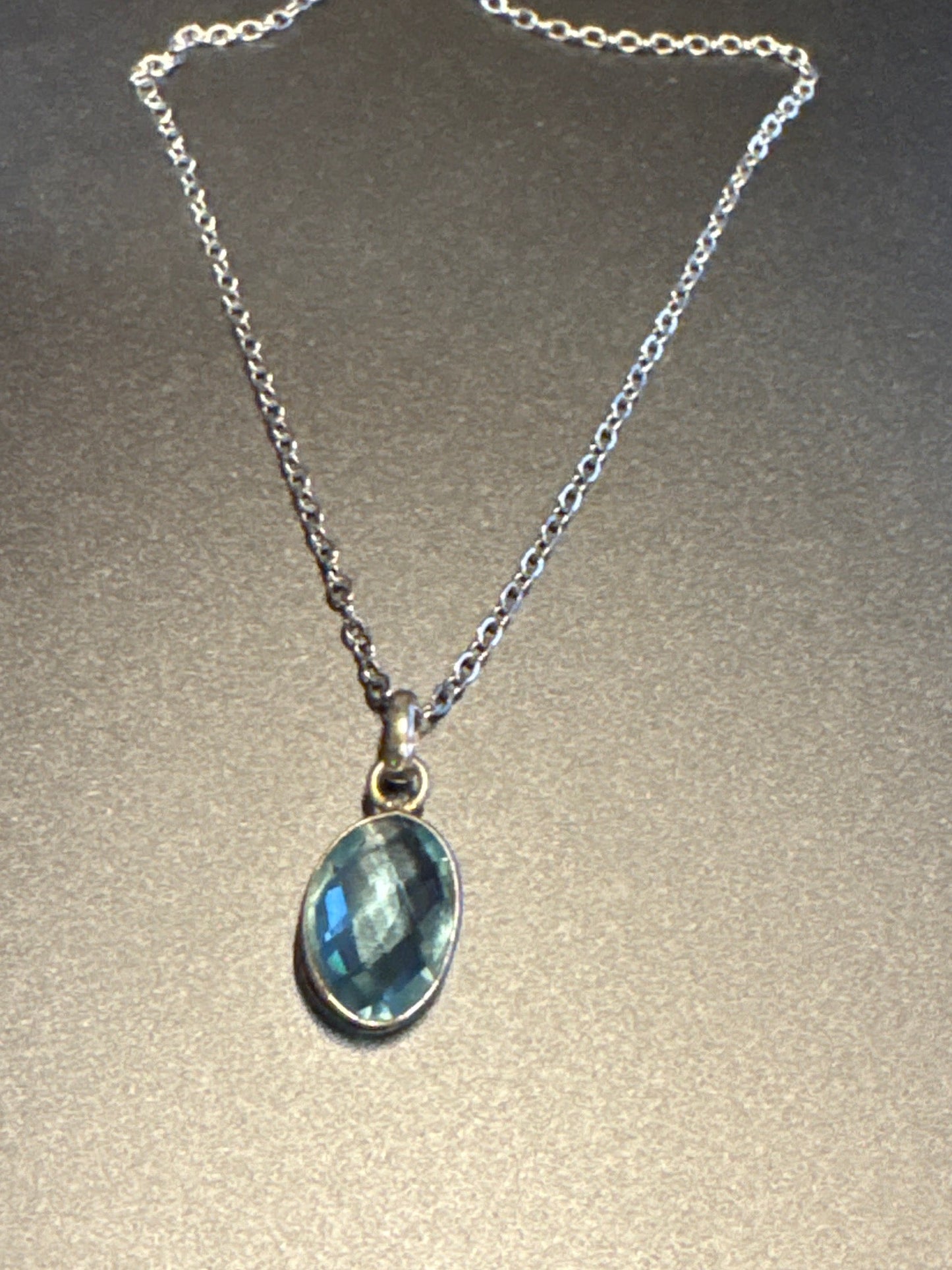 natural aquamarine bezel pendant set in silver
