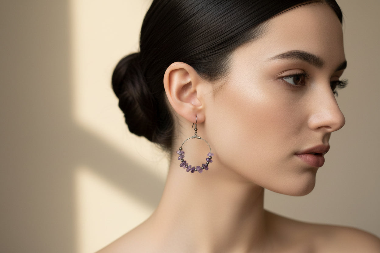 Pair of beaded earrings on a light gray background