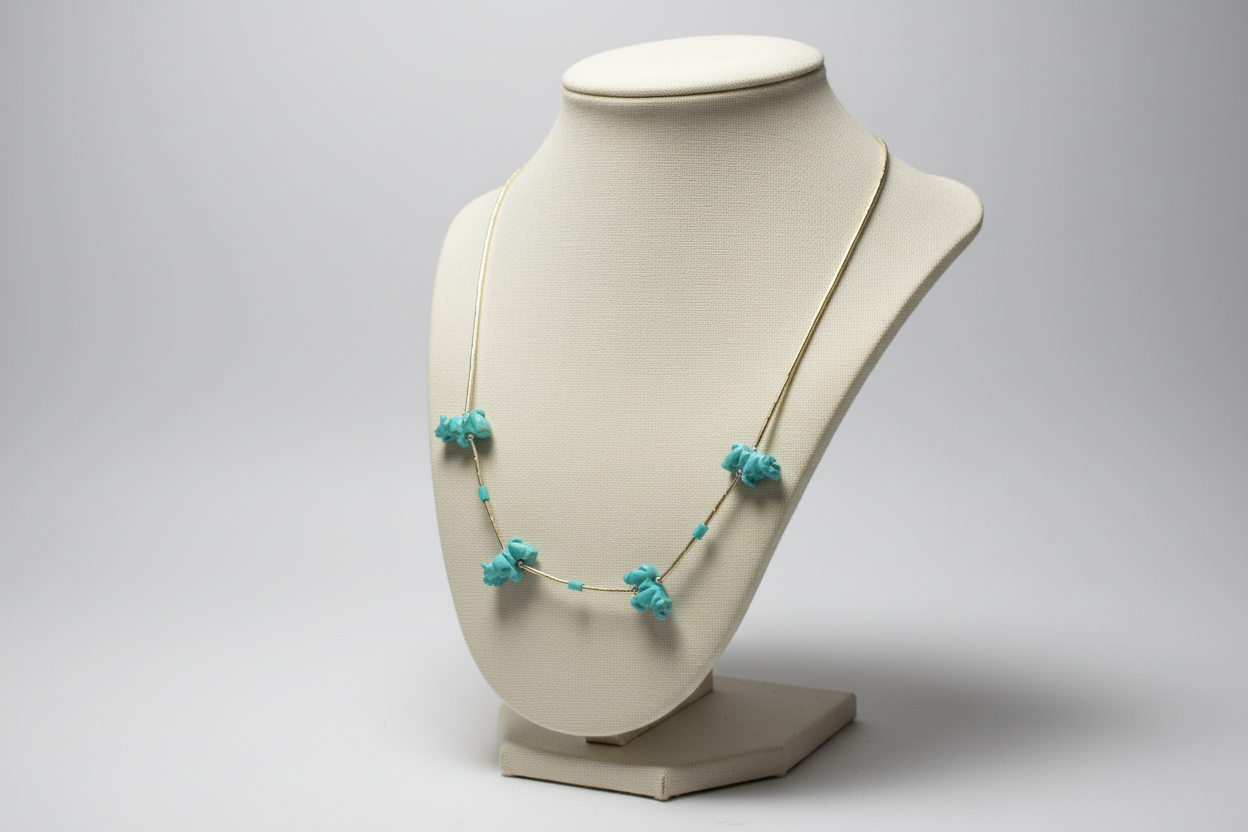 Necklace with turquoise stones on a black background