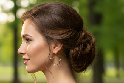 Woman in a dark blue dress holding a glass of champagne with blurred lights in the background